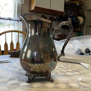 9” tall 6” wide. Antique silver pitcher